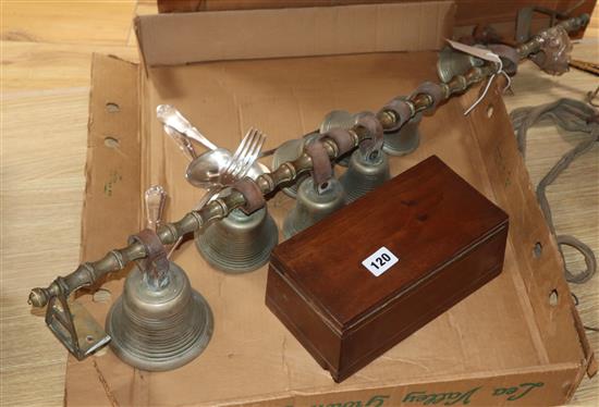 A set of brass musical bells, a box and plated cutlery